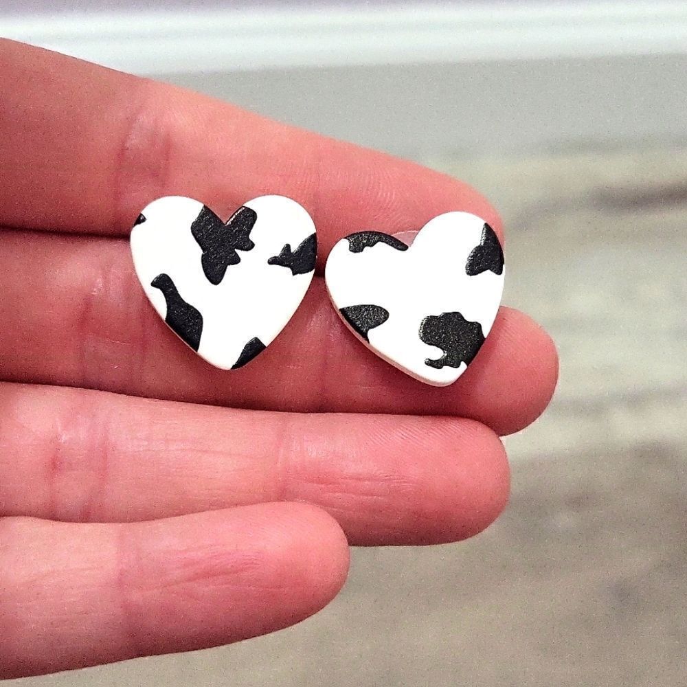 Cow print heart shaped earrings